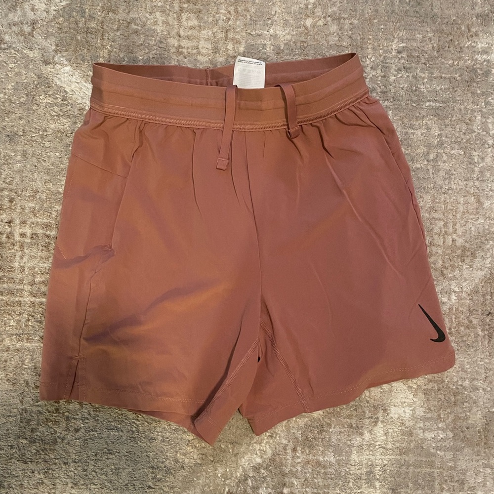 Nike Yoga Dri-FIT Pants in Brown and Pink
